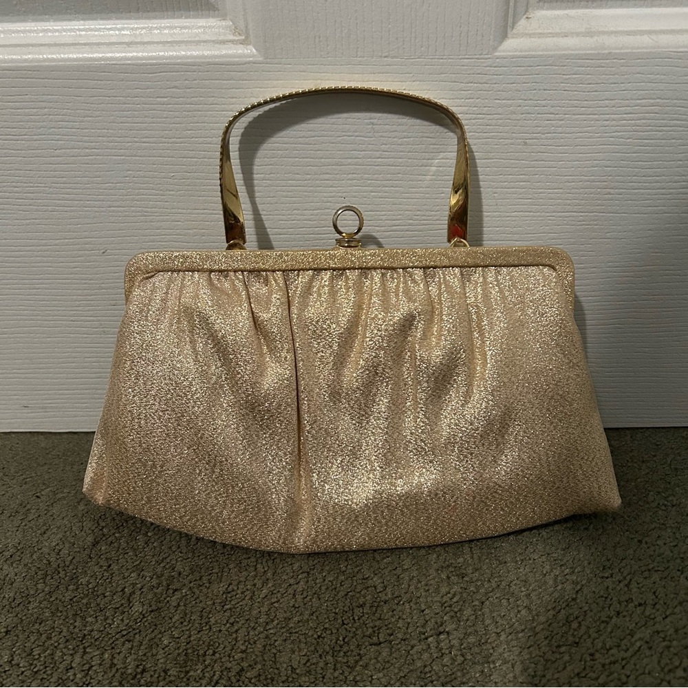 Small gold handbag.